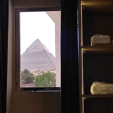 Global Pyramids Hotel Kafret el-Gabal エクステリア 写真