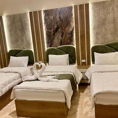 Global Pyramids Hotel Kafret el-Gabal エクステリア 写真