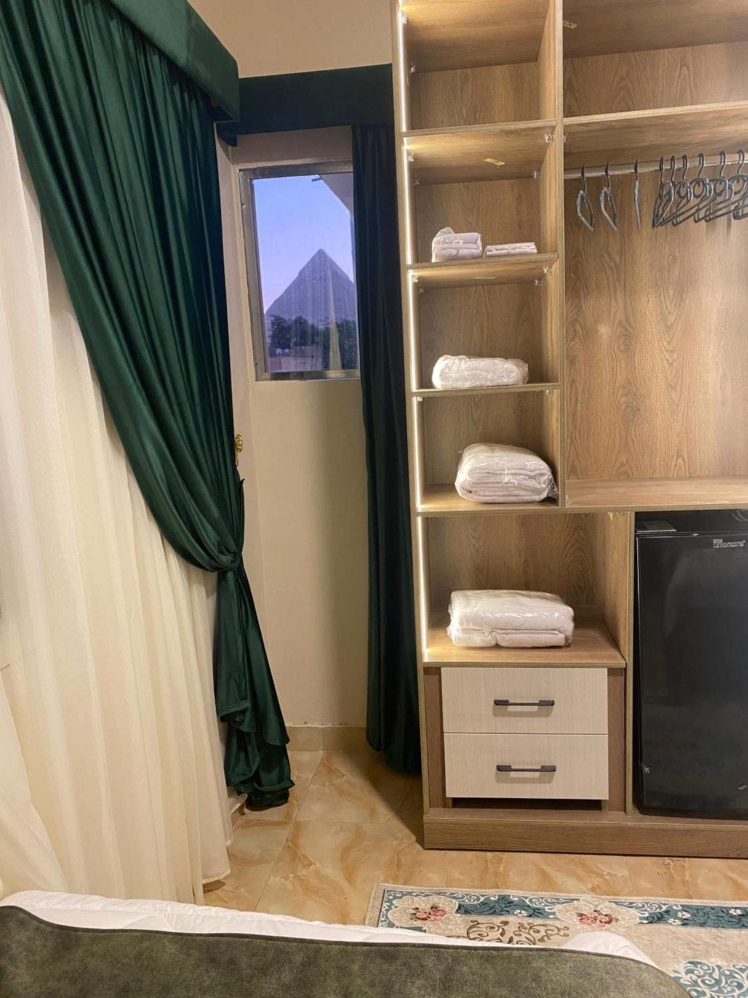 Global Pyramids Hotel Kafret el-Gabal エクステリア 写真